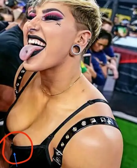 Rhea ripley Embraced when she noticed her b**bs pin out form shart OMG