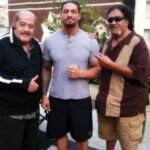 Legendary photo of Roman Reigns with his father and Uncle Afa!