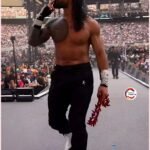 Roman Reigns walks to the ring with unparalleled confidence,