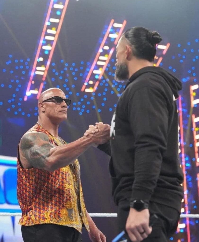 Who’s dominating the aura here: Roman Reigns or The Rock? 🔥