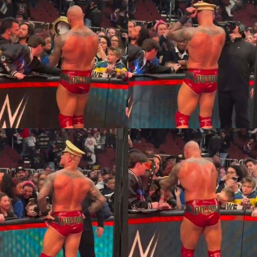 Randy Orton took a fan’ hat and did the Chelsea Green pose.