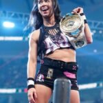 Once again your Champion, AJ Lee! 🕷️ 🏆