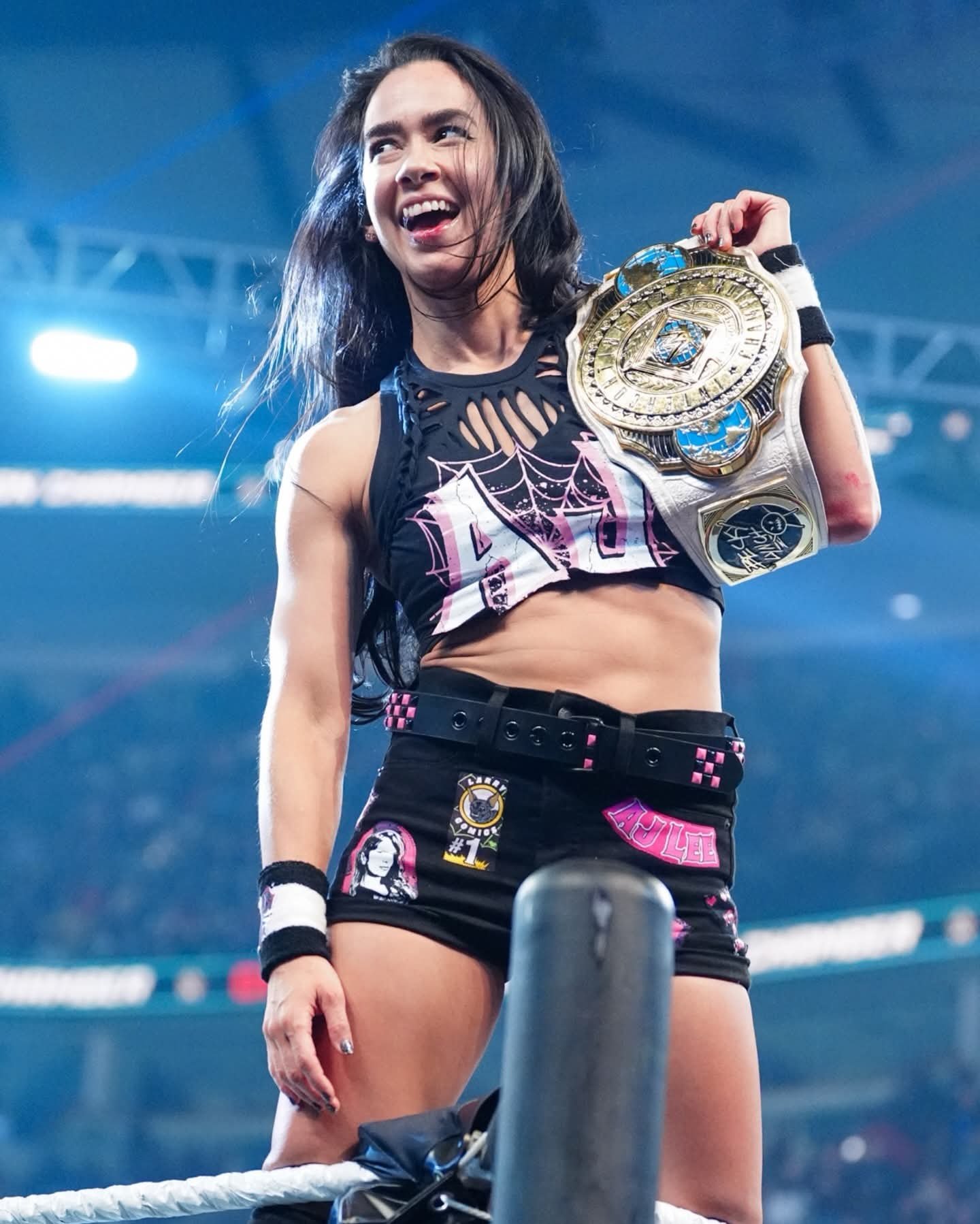 Once again your Champion, AJ Lee! 🕷️ 🏆